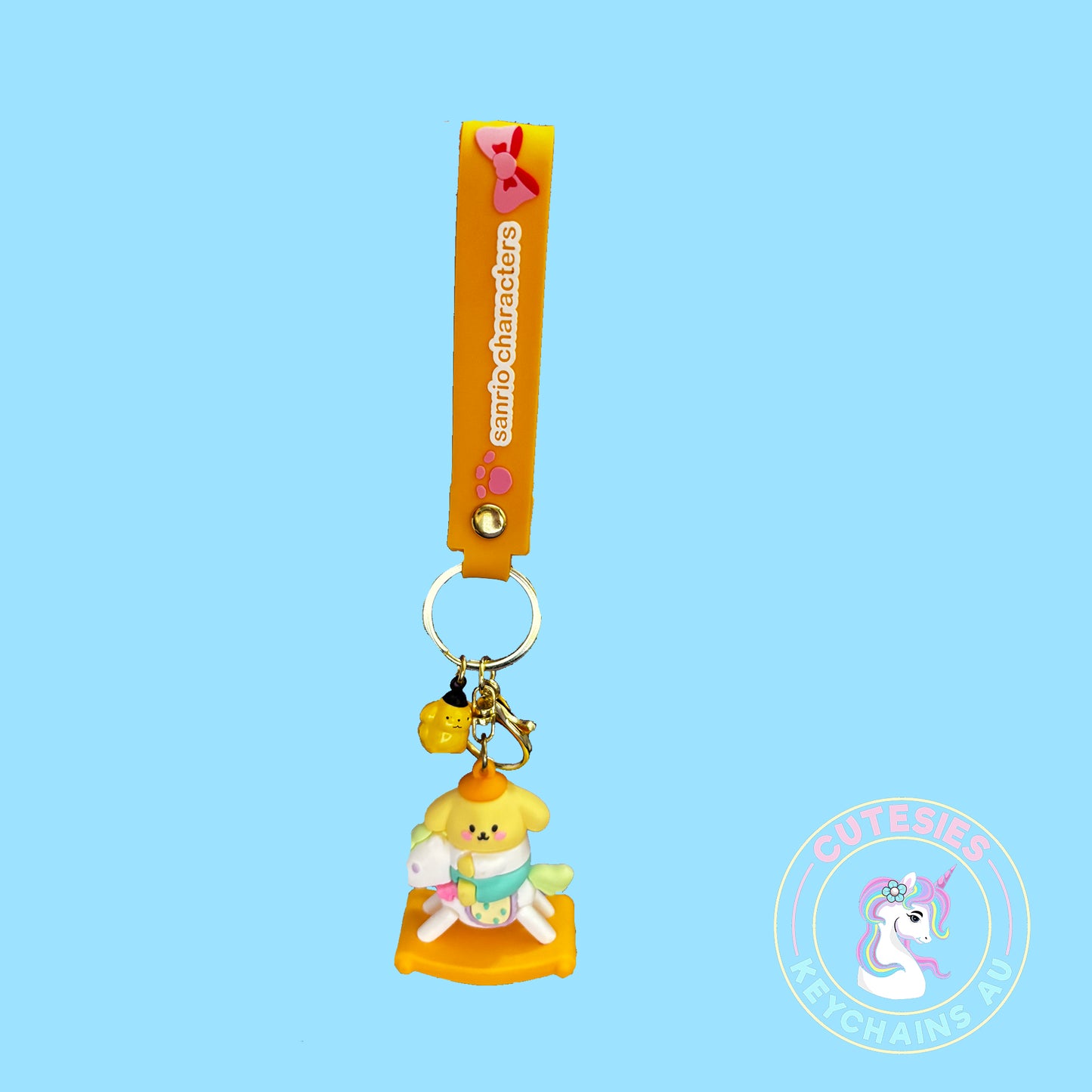 Cute Baby pompom dog on rocking horse keychain, pastel keychain, cute Kawaii keychain