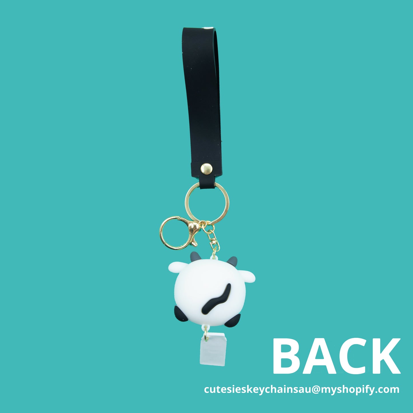 Cute black and white cow keychain with matching milk carton pendant and wristlet that says cute cow