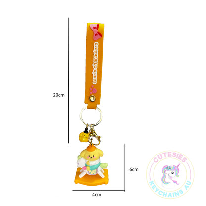 Cute Baby pompom dog on rocking horse keychain, pastel keychain, cute Kawaii keychain